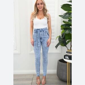 Retro high rise acid wash jeans with sash tie waist